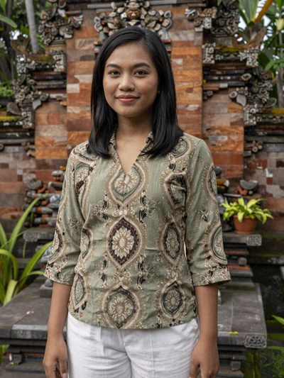 Dewi, 24, a graceful Javanese-Surinamese woman from Paramaribo with serene beauty