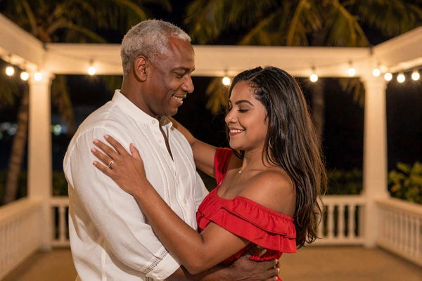 David and Ana dancing together on a tropical patio in Santo Domingo