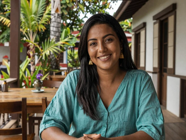 Hindustani-Surinamese woman enjoying a sunny afternoon at a Paramaribo cafe