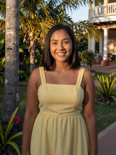 Jade, 23, a Chinese-Trinidadian woman from San Fernando with a cheerful smile