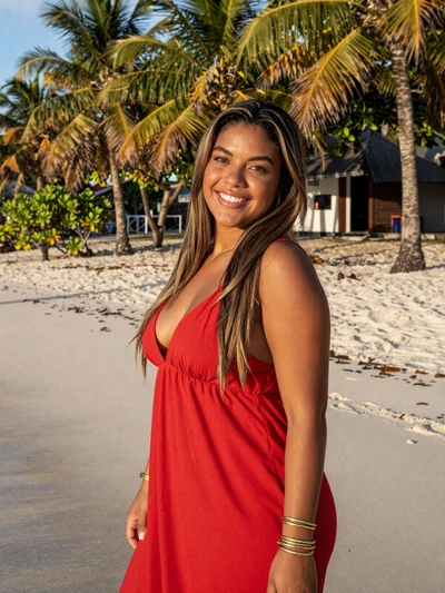 Océane, 26, a joyful Creole French Guianese woman on Montjoly Beach